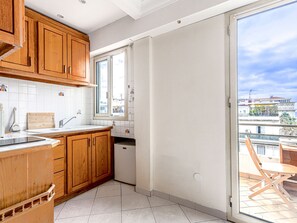 Fridge, microwave, cookware/dishes/utensils