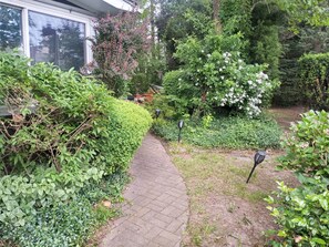 Property grounds - Charming house with private suite, parking, two blocks to train, Queens, NYC (Queens)