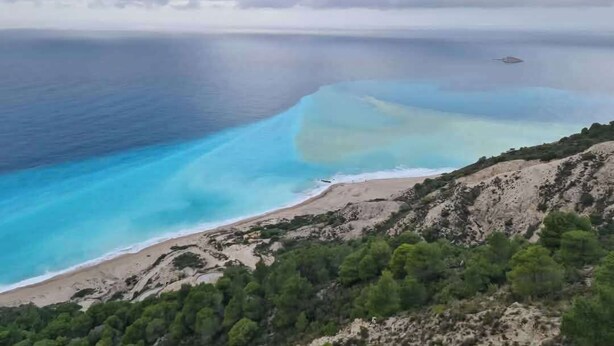 A coastal landscape with a beach and rocky terrain. - Luxury Villa- Sleeps 6 - Views, Pool, Hot Tub (Nikiana)