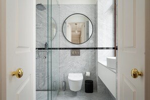 Shower, hair dryer, towels, soap