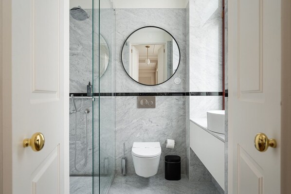 Shower, hair dryer, towels, soap