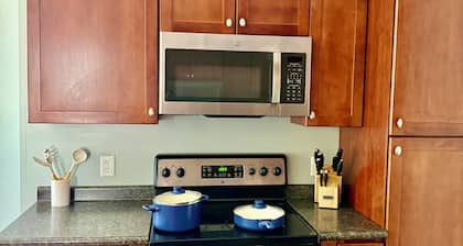 Historic apartment in downtown Sackets Harbor with WiFi and a king bed.