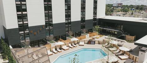 Soak up sunshine beside a resort-style pool and cabanas.