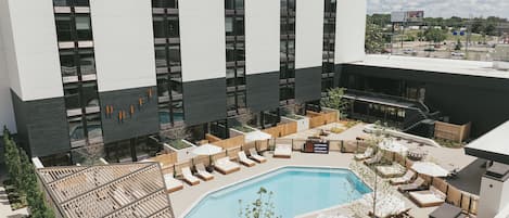 Soak up sunshine beside a resort-style pool and cabanas.