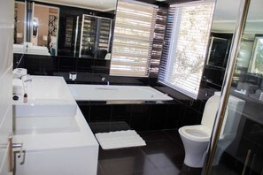 Jetted tub, towels, soap, toilet paper
