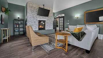 Smart TV, fireplace, foosball, books