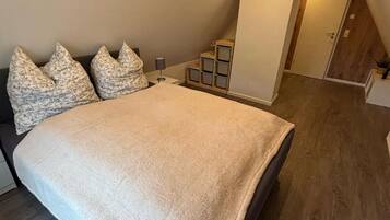 2 dormitorios, tabla de planchar con plancha, wifi gratis y ropa de cama