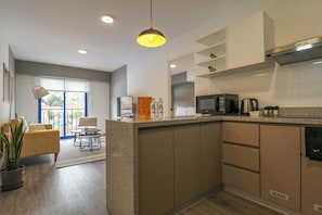 Microwave, stovetop, coffee/tea maker, toaster