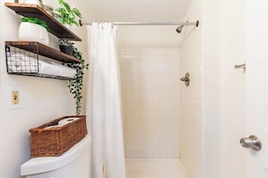 Shower, hair dryer, towels, soap