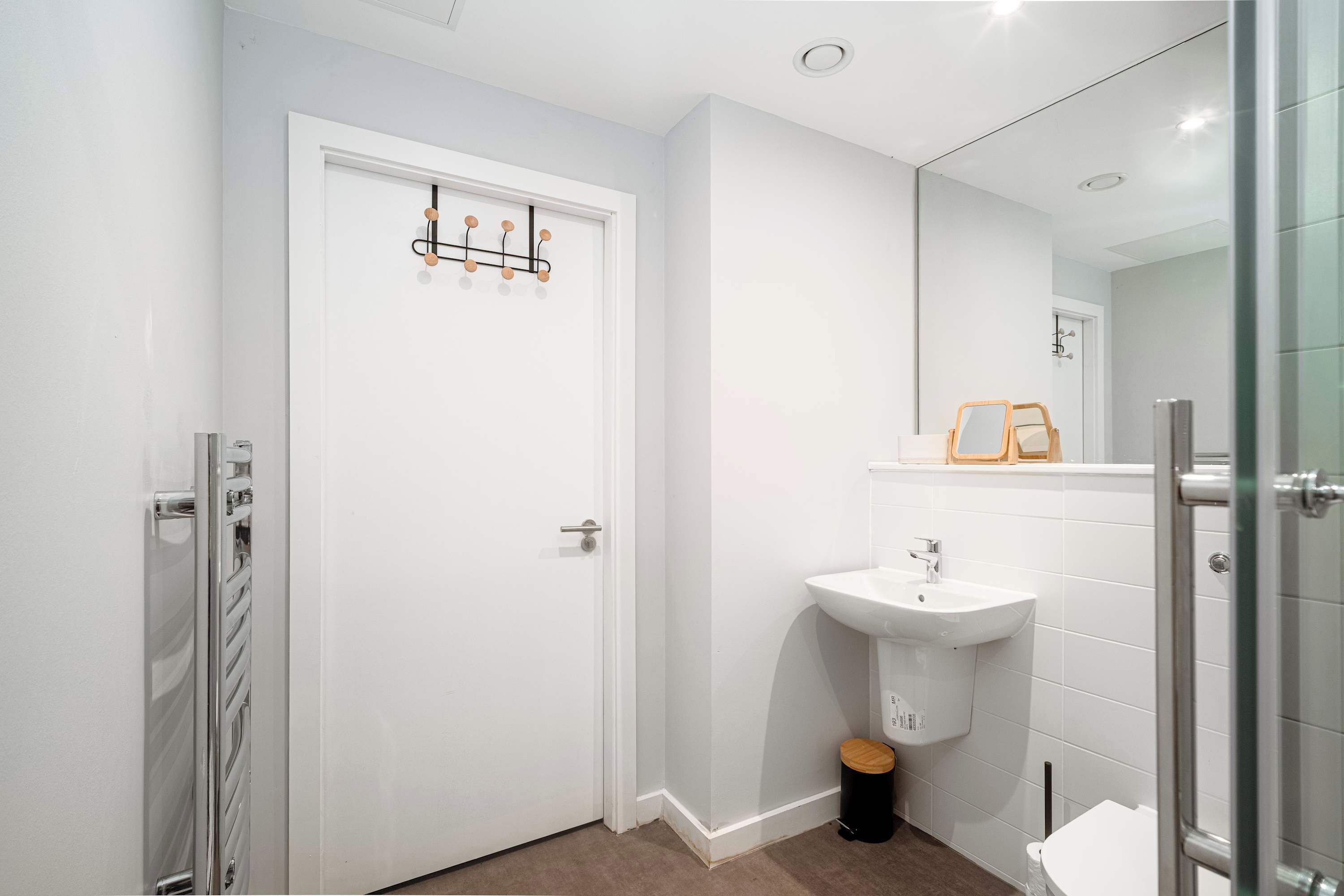 Shower, hair dryer, towels, shampoo