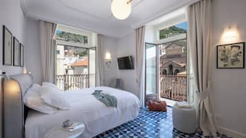 Habitación Deluxe, balcón, vista al mar | Caja de seguridad en la habitación, insonorización y wifi gratis