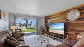 Signature Condo, 2 Bedrooms, Non Smoking, Beachfront | Living room | 42-inch Smart TV with digital channels