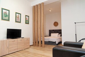 Appartement, 1 très grand lit et 1 canapé-lit | 1 chambre, rideaux occultants, fer et planche à repasser, Wi-Fi gratuit