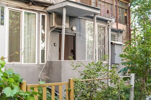 Apartamento, 1 cama King e sofá-cama | Vista para o pátio