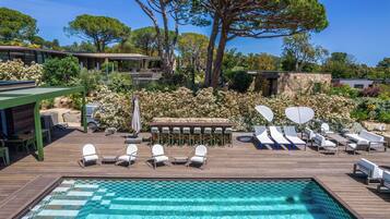 Seasonal outdoor pool, pool umbrellas, pool loungers