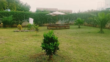 Apartment, Balcony, Garden View | Living area | Flat-screen TV
