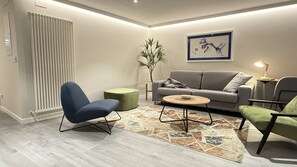Apartamento superluxo, 1 quarto | Área de estar | TV LED