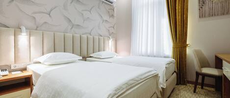 Standard Twin Room, City View | In-room safe, laptop workspace, iron/ironing board, free WiFi