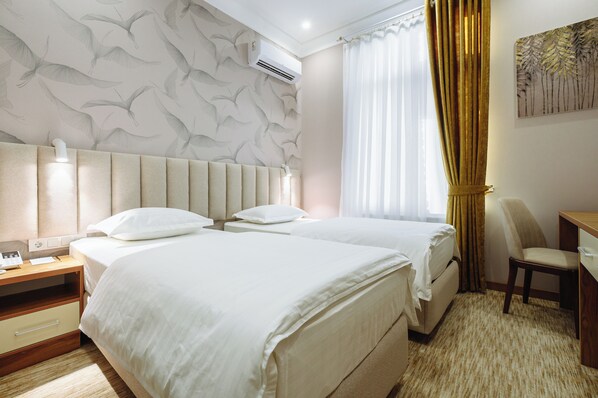 Standard Twin Room, City View | In-room safe, laptop workspace, soundproofing, iron/ironing board - Clouds Hotel Tashkent (Tashkent)
