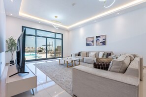 TV - Sea Views 4BR + Maids Room Villa with Private Pool, Kid's Pool, BBQ Facility (Fujairah)