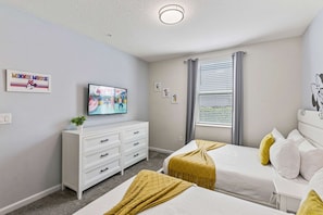 - Step into a magical retreat with a fun Mickey & Minnie themed bedroom
- Unwind in cozy twin beds while enjoying your favorite Disney movies on the smart TV
- Thoughtfully designed with bright decor, comfy linens, and a playful Disney touch - Kissimmee Retreat: Cozy 2BR Condo near Theme Parks (Kissimmee)