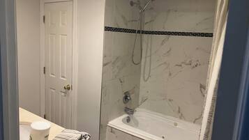 Hair dryer, towels, soap, toilet paper