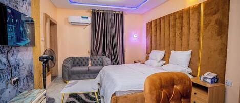 Family Room, Balcony, City View | Desk, laptop workspace, blackout drapes, soundproofing