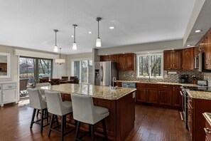 Dishwasher, coffee/tea maker, cookware/dishes/utensils