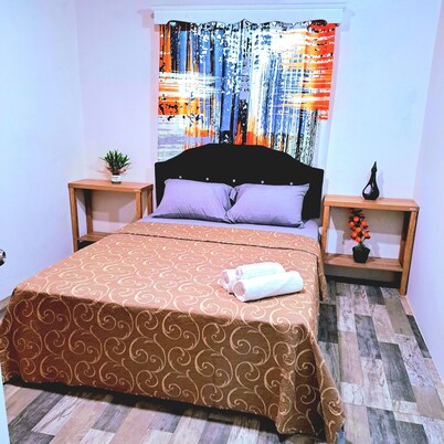 Charming 2-bedroom apartment in lovely Woodbrook, Port of Spain with WiFi, AC