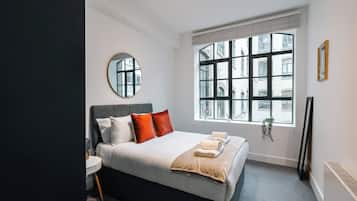 2 slaapkamers, een strijkplank/strijkijzer, beddengoed