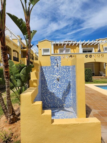 Escape to the heart of a golf course: House with sea and mountain views