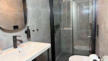 Hair dryer, towels, soap, shampoo