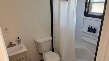 Hair dryer, towels, soap, shampoo