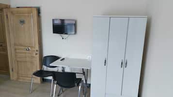 Premium bedding, desk, laptop workspace, soundproofing