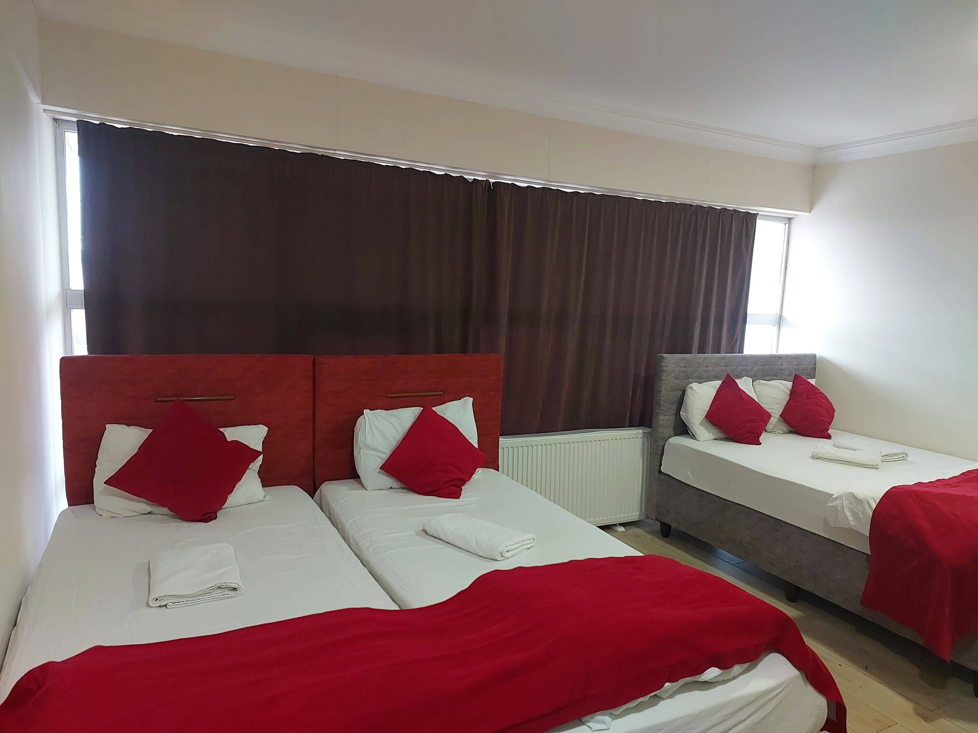 Family Quadruple Room, City View | Desk, laptop workspace, soundproofing, WiFi (free)