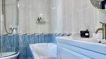 Hair dryer, towels, soap, shampoo