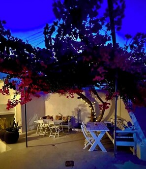 Outdoor dining - On Santorini, in the center of the island at Messaria a typical Cycladic house (Fira)
