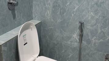 Hair dryer, slippers, towels, soap