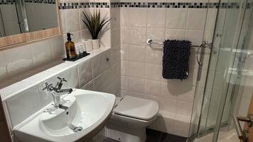 Hair dryer, towels, soap, shampoo