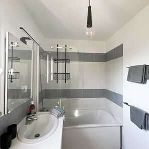 Hair dryer, towels, soap, toilet paper