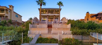 Amazing Riverfront home with dock, boat ramp, fire pit on the Colorado river.