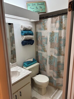 Hair dryer, towels, soap, toilet paper