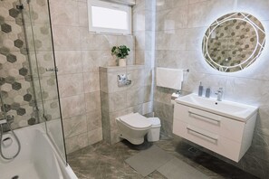Hair dryer, towels, soap, toilet paper