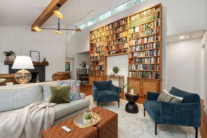TV, fireplace, books, offices