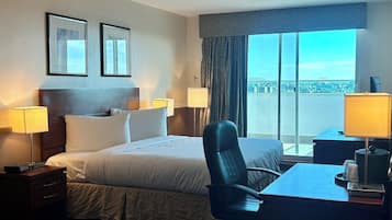 Deluxe King Room with Balcony | 1 bedroom, desk, laptop workspace, iron/ironing board