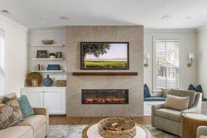 TV connectée, cheminée, médiathèque