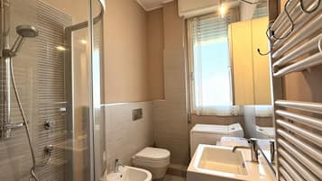 Shower, bidet, towels