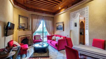 Smart TV, fireplace, books