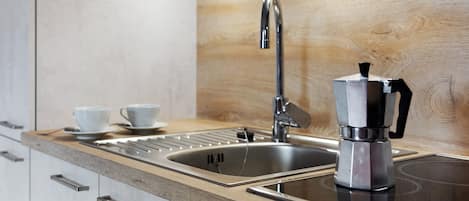 Fridge, microwave, stovetop, coffee/tea maker