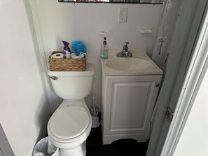 Hair dryer, towels, soap, toilet paper